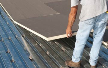 benefits of insulating Buttons Green flat roofing